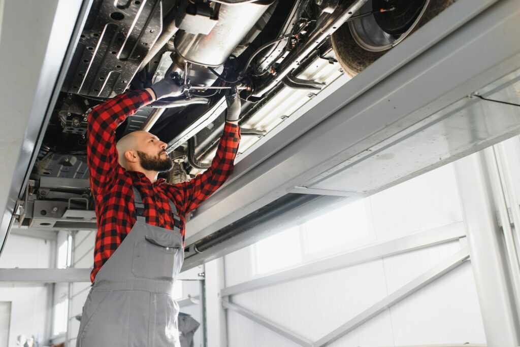Auto mechanic working at auto repair shop